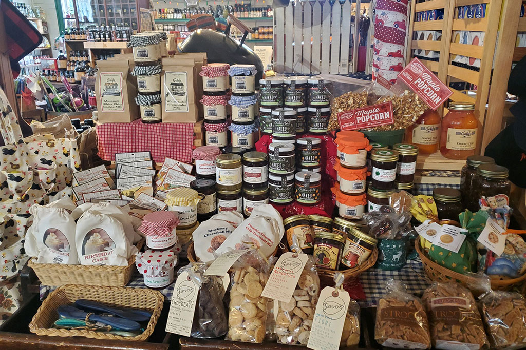 Calef's summer display with homemade baking mixes, jams, and cookies